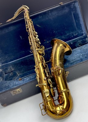 Lot 458 - A gilt lacquered tenor saxophone, by C.G.Conn,...