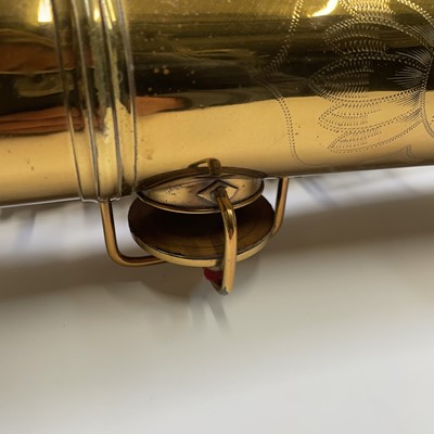 Lot 458 - A gilt lacquered tenor saxophone, by C.G.Conn,...