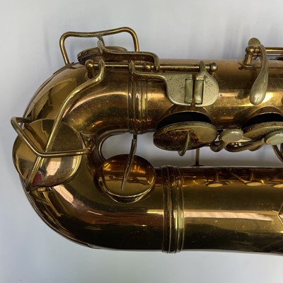 Lot 458 - A gilt lacquered tenor saxophone, by C.G.Conn,...