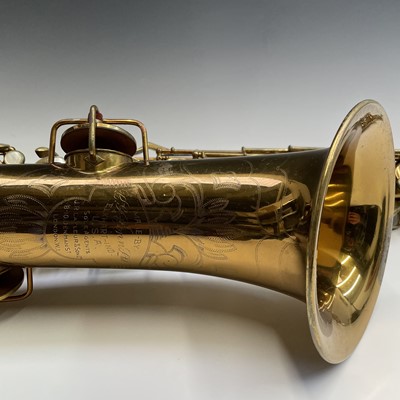 Lot 458 - A gilt lacquered tenor saxophone, by C.G.Conn,...