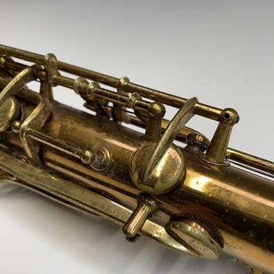 Lot 458 - A gilt lacquered tenor saxophone, by C.G.Conn,...