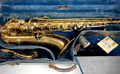 Lot 458 - A gilt lacquered tenor saxophone, by C.G.Conn,...