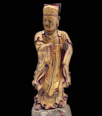 Lot 87 - A large Chinese gilt wood and red lacquer...