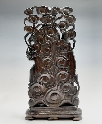 Lot 46 - A Chinese carved wood group of four of the...