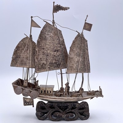 Lot 44 - A Chinese silver model of a junk, early 20th...
