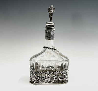 Lot 37 - A Dutch glass decanter with cast silver base...