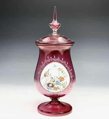 Lot 1084 - A 19th century cranberry glass biscuit barrel...