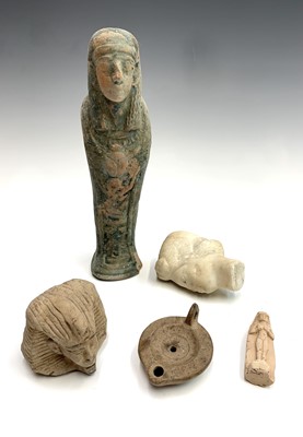Lot 300 - A Roman pottery lamp, a reproduction Egyptian...