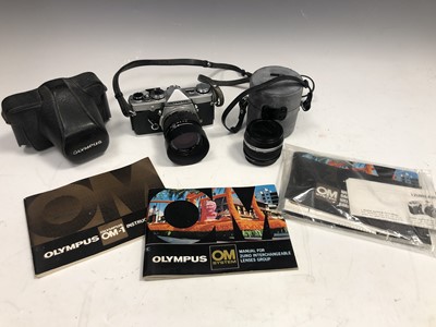 Lot 2 - An Olympus OM-1 SLR camera, 50mm lens,...