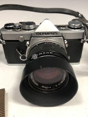 Lot 2 - An Olympus OM-1 SLR camera, 50mm lens,...