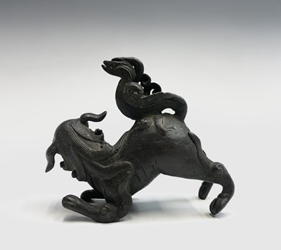 Lot 40 - A Chinese bronze model of a dog of fo, 19th...