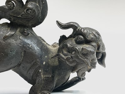 Lot 40 - A Chinese bronze model of a dog of fo, 19th...