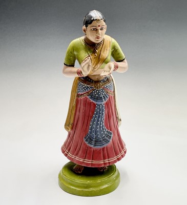 Lot 1016 - An Indian painted papier mache figure of a...