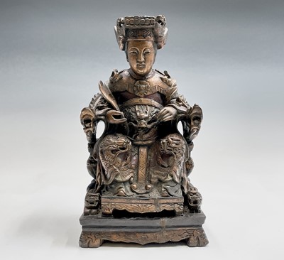 Lot 165 - A Chinese carved wood figure of a Taoist deity,...