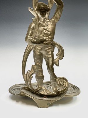 Lot 147 - A brass umbrella stand cast with a male figure....