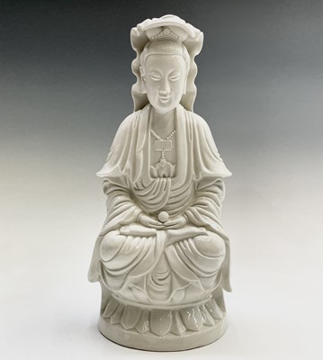 Lot 25 - A large Chinese blanc de chine figure of a...