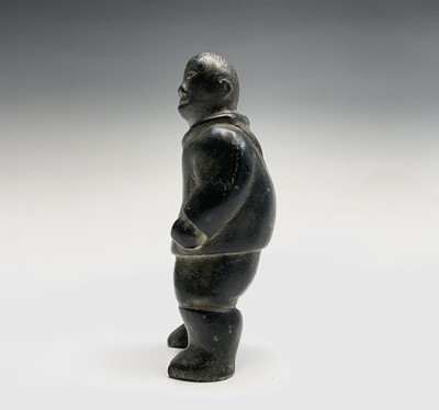 Lot 184 - An Inuit and carved stone figure, probably...