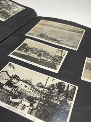 Lot 163 - An album of photographs, titled 'World Cruise...