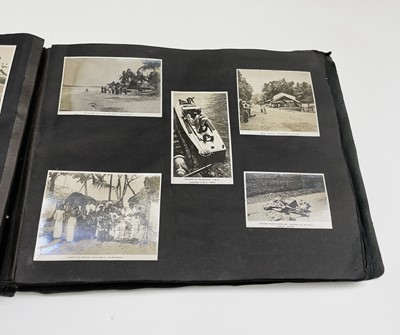 Lot 163 - An album of photographs, titled 'World Cruise...