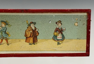 Lot 186 - A late 19th century tin plate and brass magic...