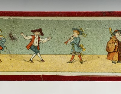 Lot 186 - A late 19th century tin plate and brass magic...