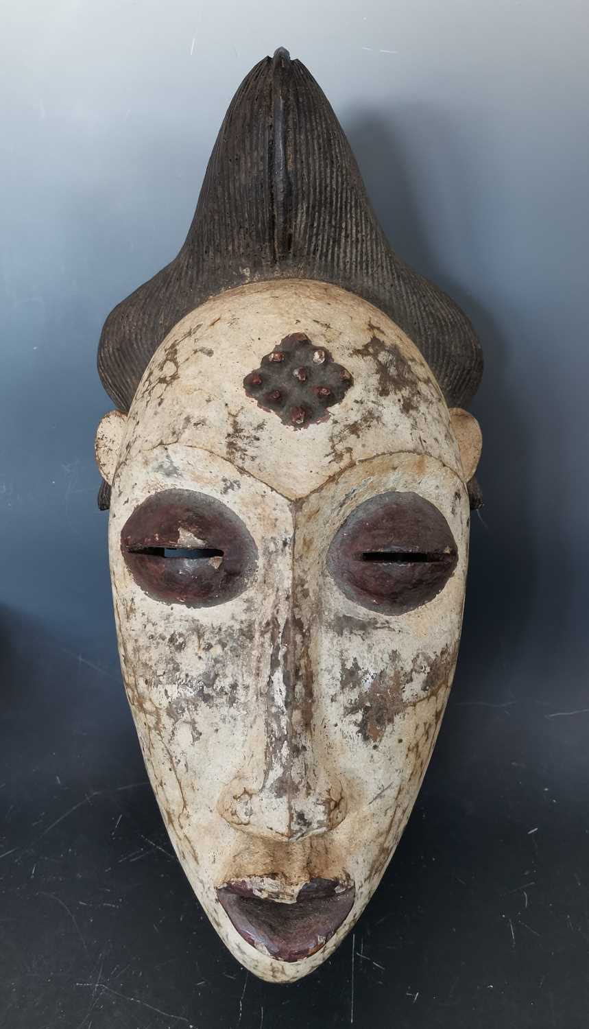 Lot 6 - An antique African tribal mask.