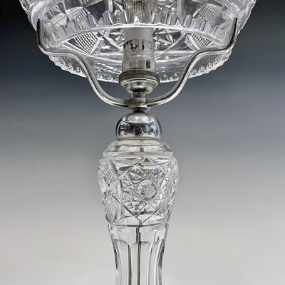 Lot 943 - A cut glass table lamp and shade, with hobnail...