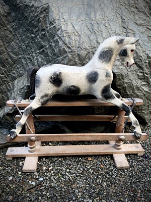 Lot 114 - A Victorian painted dapple grey rocking horse,...