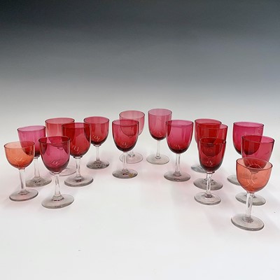 Lot 940 - A collection of assorted cranberry glass wines,...