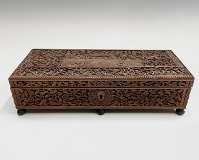 Lot 1027 - An Anglo-Indian carved sandalwood box, 19th...