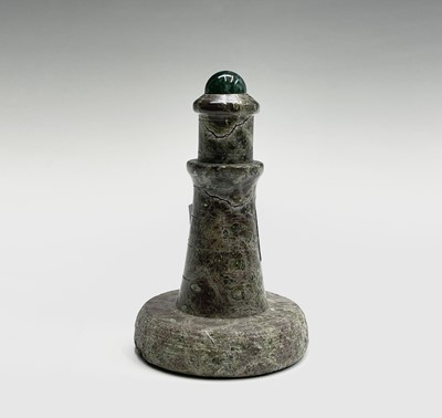 Lot 212 - A Cornish serpentine sculpture of a lighthouse...