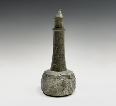 Lot 212 - A Cornish serpentine sculpture of a lighthouse...