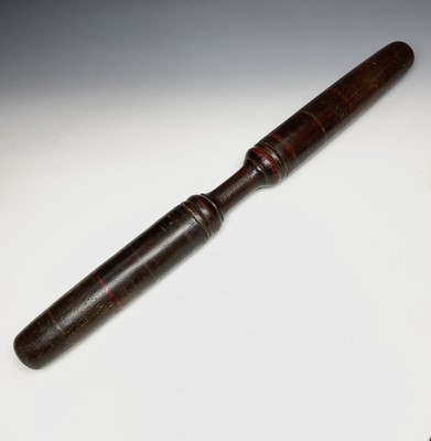 Lot 382 - A turned heavy hardwood baton, 19th century,...