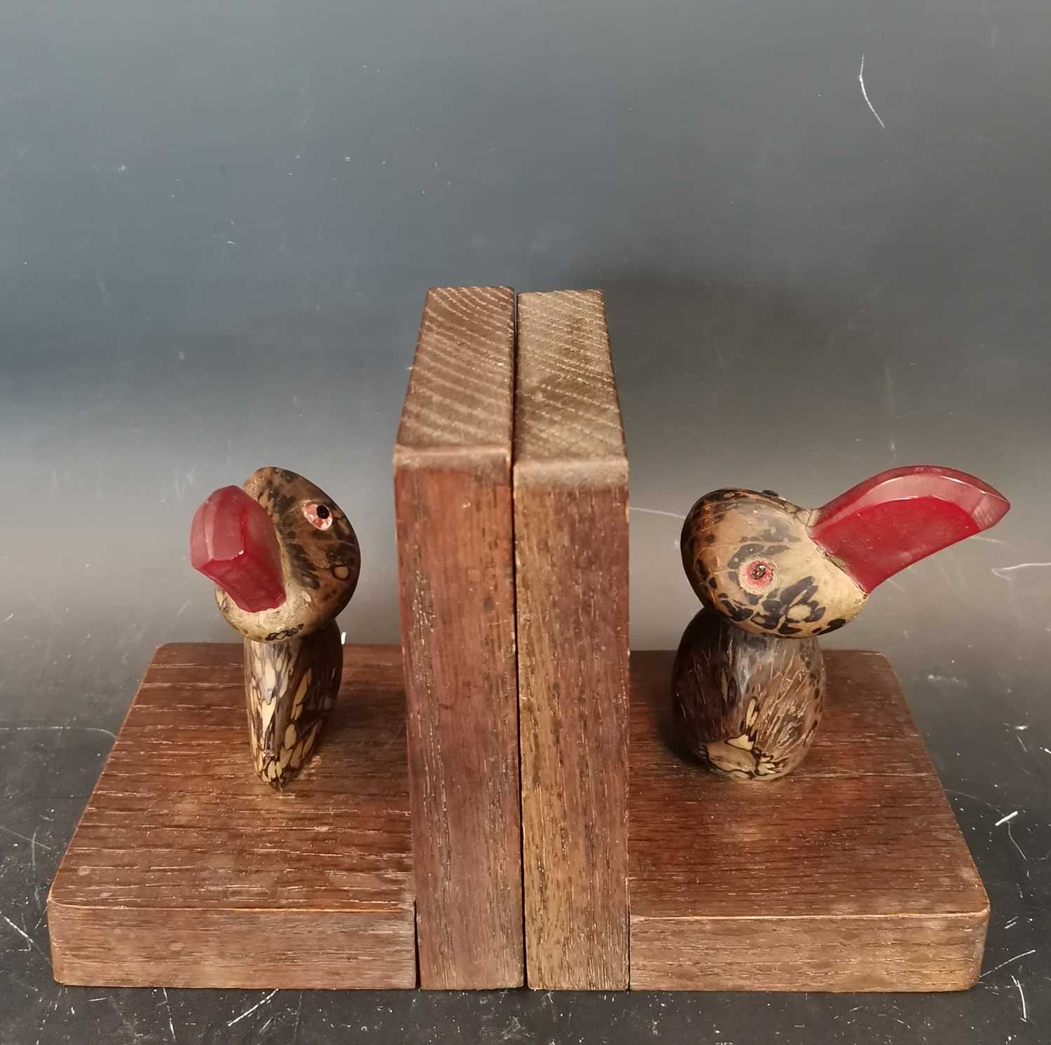 Lot 15 - A pair of vintage glass eyed nut bird bookends,...