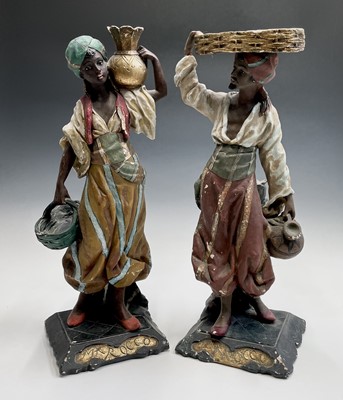 Lot 1028 - A pair of Moroccan style plaster figures,...