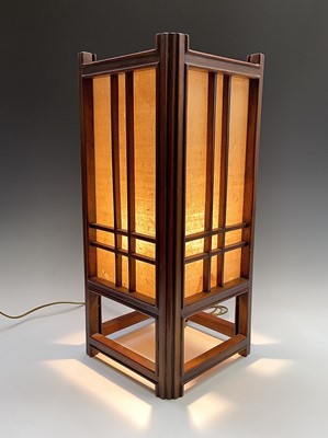 Lot 197 - A Chinese hardwood lamp, 20th century, with a...