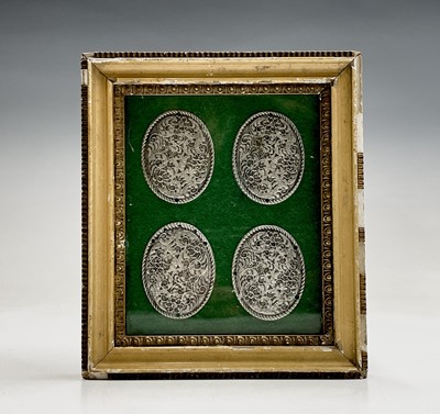 Lot 1030 - Four Islamic white metal oval tags, 19th...