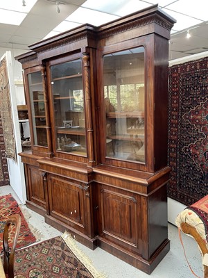 Lot 3136 - A large Victorian mahogany breakfront bookcase,...