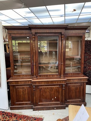 Lot 3136 - A large Victorian mahogany breakfront bookcase,...