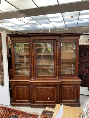 Lot 3136 - A large Victorian mahogany breakfront bookcase,...