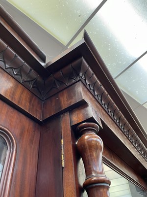 Lot 3136 - A large Victorian mahogany breakfront bookcase,...