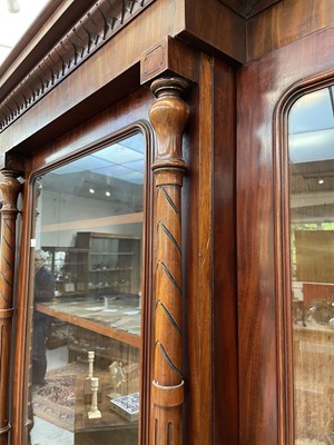 Lot 3136 - A large Victorian mahogany breakfront bookcase,...