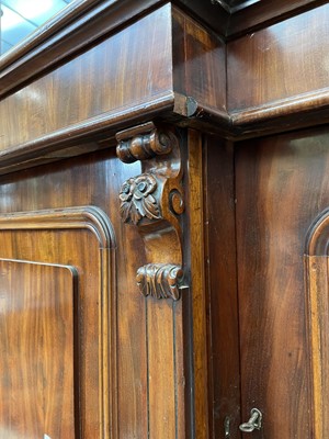 Lot 3136 - A large Victorian mahogany breakfront bookcase,...