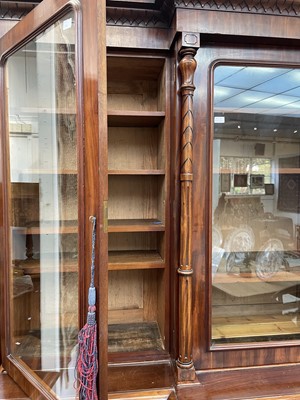 Lot 3136 - A large Victorian mahogany breakfront bookcase,...