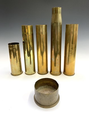 Lot 197 - Six assorted WWI and WWII brass shell cases,...