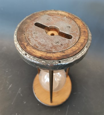 Lot 17 - An antique sand timer with pewter collars.