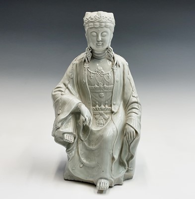 Lot 97 - A Chinese qingbai glaze figure of Guanyin,...