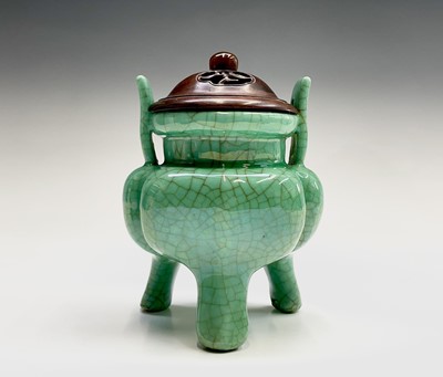 Lot 185 - A Chinese green crackle glazed tripod censer,...