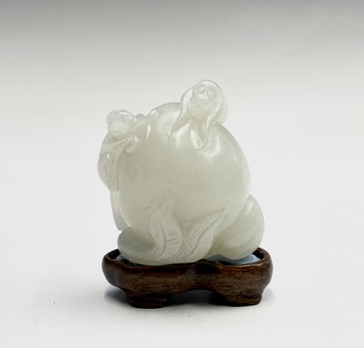 Lot 171 - A Chinese carved jade model of a peach...