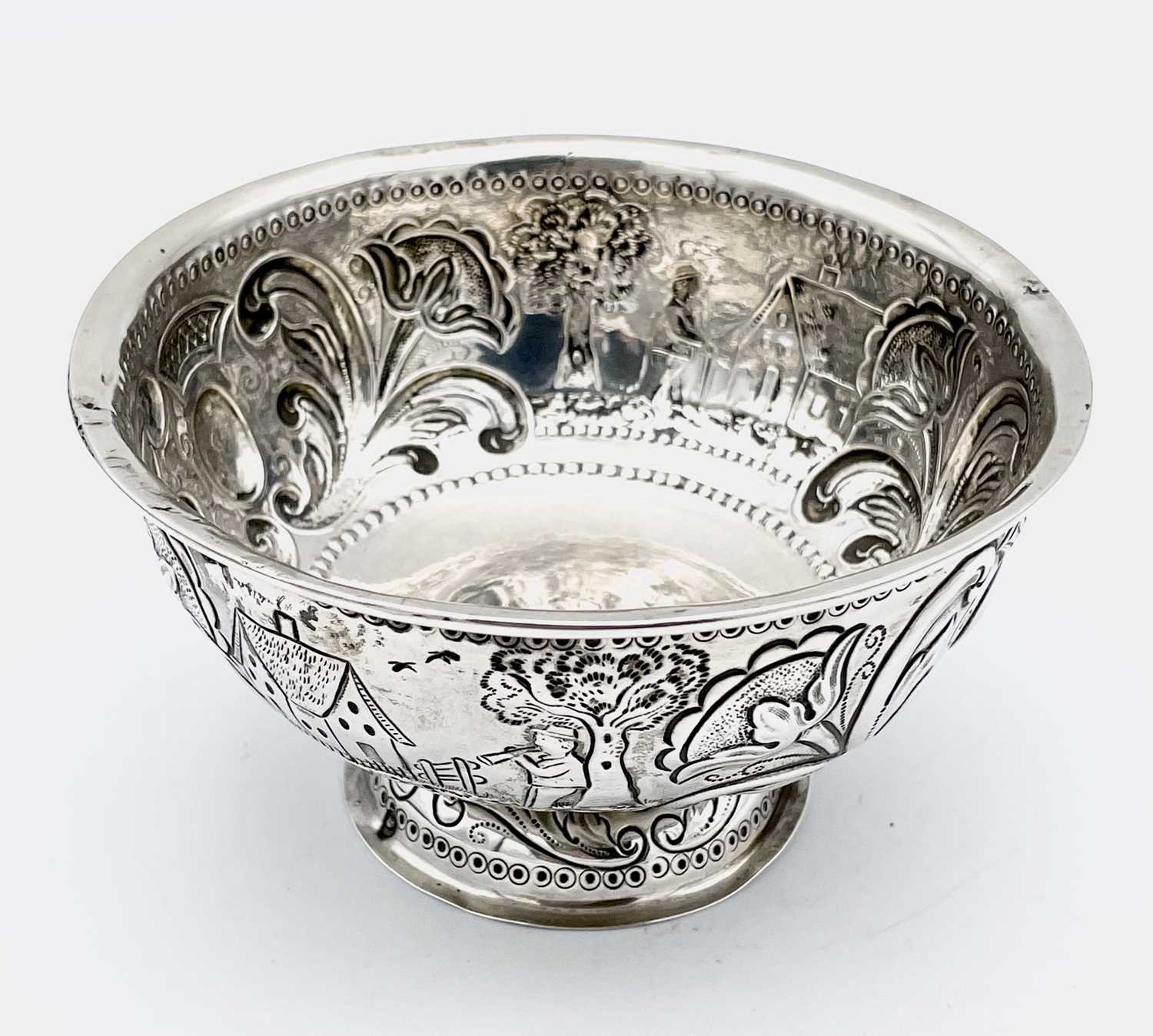 Lot 52 - A Dutch repouse silver footed bowl 12.5cm